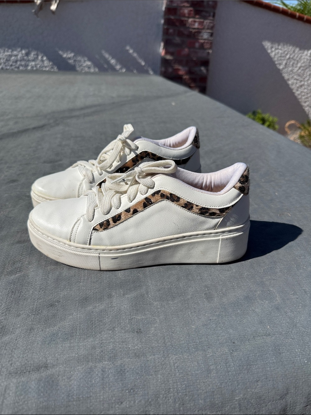Stylish White Sneakers with Leopard Accents